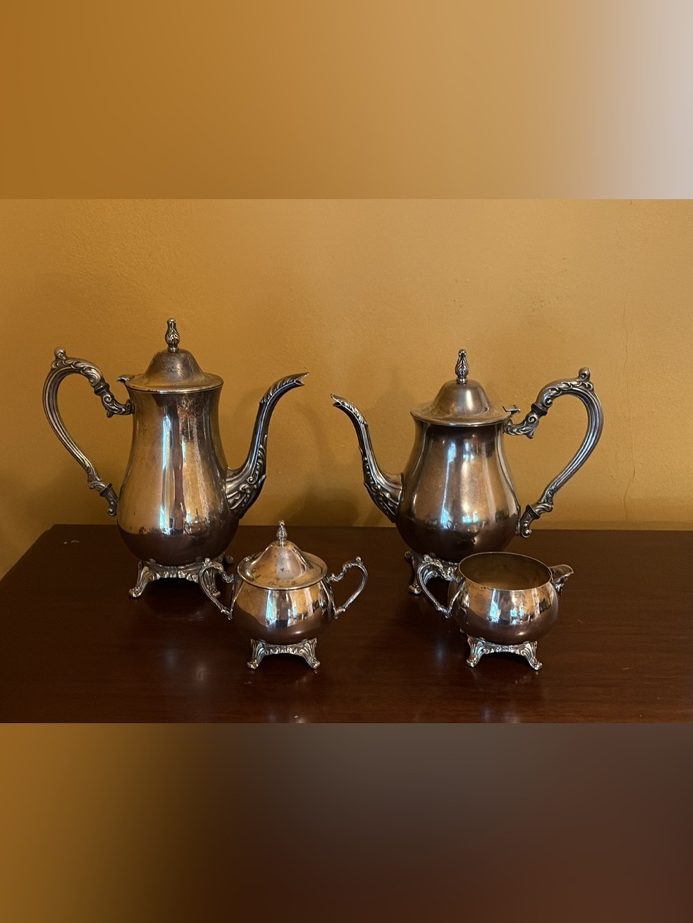 Oneida coffee and tea set with sugar bowl and creamer.